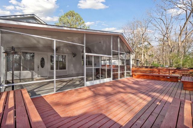 deck featuring a sunroom