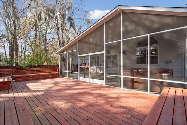 wooden terrace featuring a sunroom