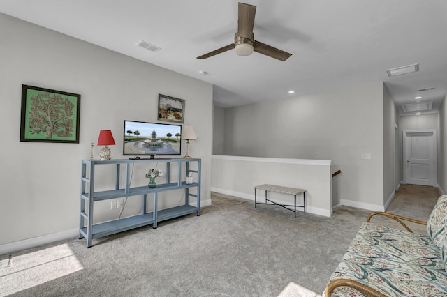 living room with light colored carpet and ceiling fan