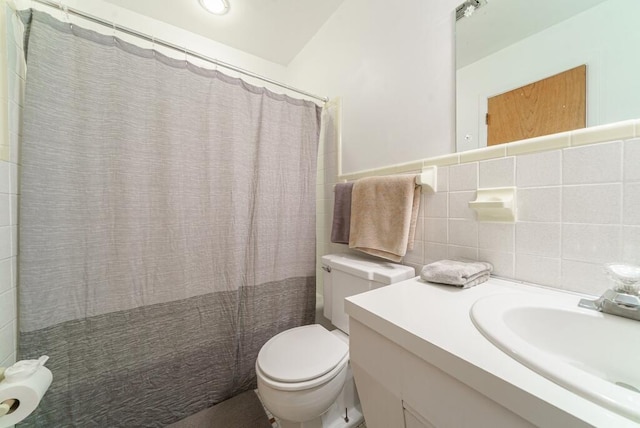 full bathroom featuring toilet, tile walls, vanity, and a shower with shower curtain