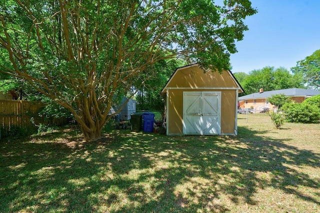 view of shed featuring a fenced backyard