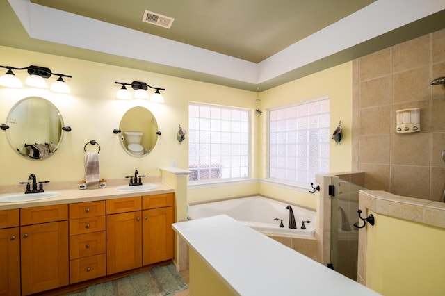 212 Chester Ln, Cottageville, SC 29435 - full bath featuring a sink, tiled shower, a garden tub, and visible vents