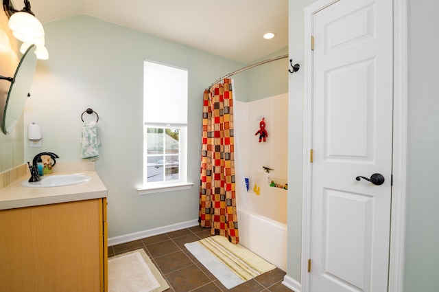 212 Chester Ln, Cottageville, SC 29435 - full bathroom featuring tile patterned flooring, vanity, lofted ceiling, baseboards, and shower / bath combination with curtain