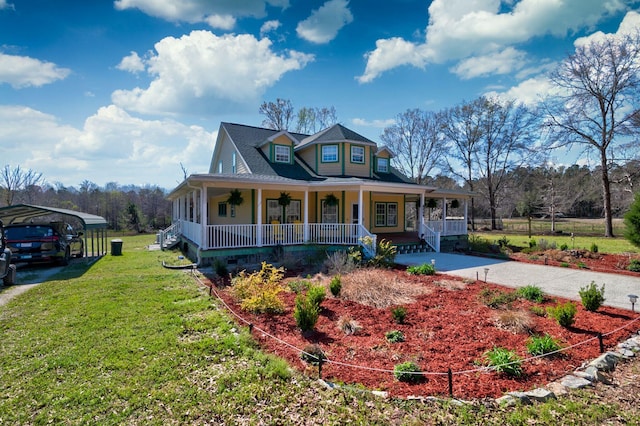 212 Chester Ln, Cottageville, SC 29435 - farmhouse inspired home with driveway, a front yard, a carport, and a porch