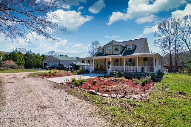 212 Chester Ln, Cottageville, SC 29435 - farmhouse inspired home featuring driveway, a porch, and a front yard