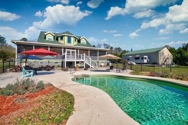 212 Chester Ln, Cottageville, SC 29435 - view of swimming pool featuring fence, a sunroom, a patio area, and a fenced in pool