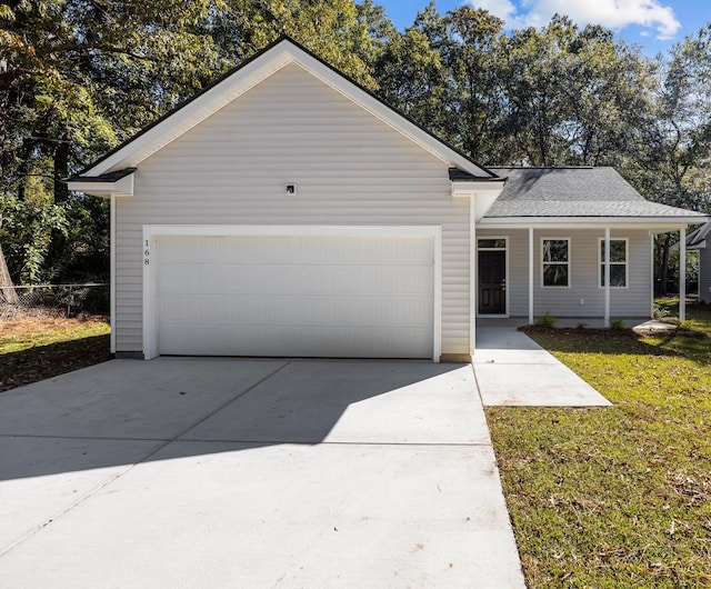 single story home with a front lawn and a garage