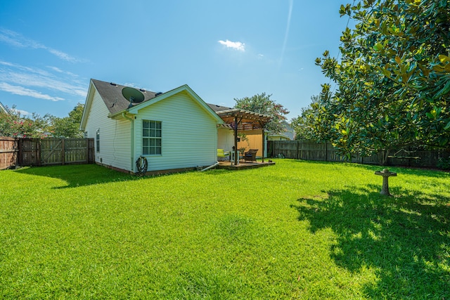 view of yard with a pergola