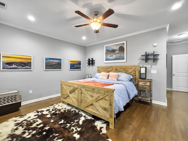 bedroom with crown molding, dark hardwood / wood-style floors, and ceiling fan