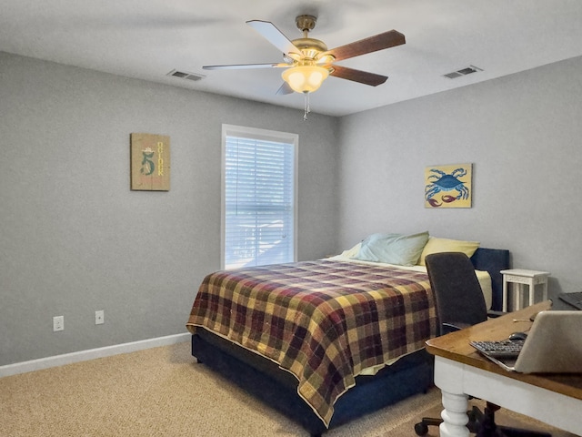 bedroom with ceiling fan and carpet flooring