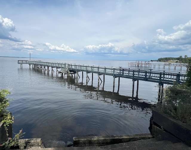 view of dock with a water view