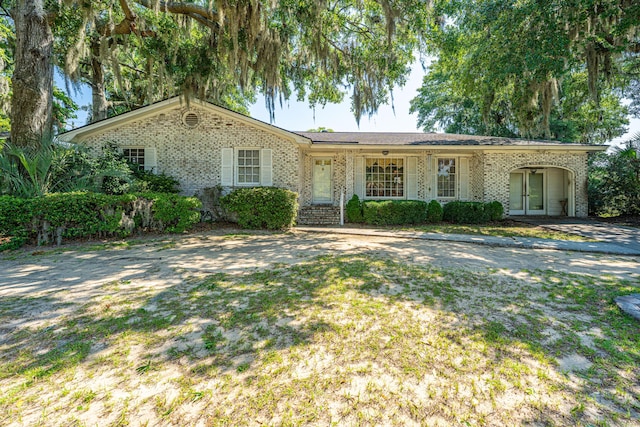 5302 Helene Dr, North Charleston, SC 29418 - single story home with brick siding and french doors
