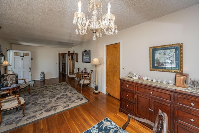5302 Helene Dr, North Charleston, SC 29418 - living area with a chandelier, wood finished floors, and a textured ceiling