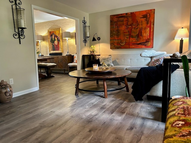 living area with hardwood / wood-style floors