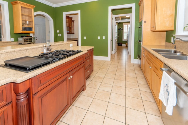 kitchen with glass insert cabinets, light countertops, dishwasher, and a sink