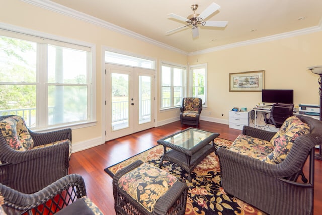 living room with dark wood-style floors, french doors, ornamental molding, a ceiling fan, and baseboards