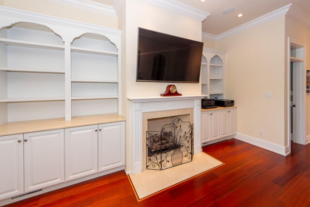 bedroom featuring crown molding, ceiling fan, and dark hardwood / wood-style flooring