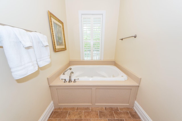 full bath with a garden tub