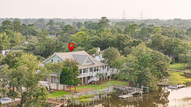 birds eye view of property featuring a water view