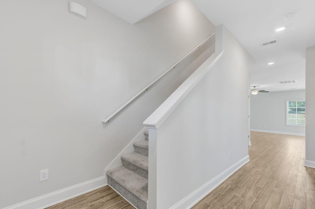 224 Young Town Cir, Orangeburg, SC 29118 - stairs with baseboards, wood finished floors, visible vents, and recessed lighting