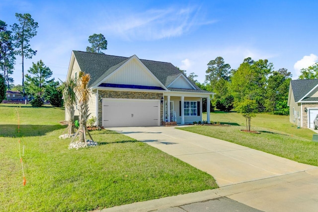224 Young Town Cir, Orangeburg, SC 29118 - traditional-style home featuring an attached garage, stone siding, driveway, and a front yard