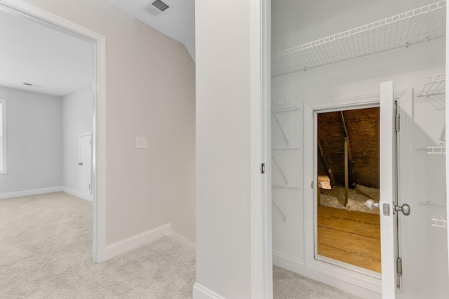 224 Young Town Cir, Orangeburg, SC 29118 - hallway with baseboards, visible vents, and light colored carpet