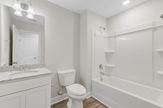 224 Young Town Cir, Orangeburg, SC 29118 - bathroom featuring toilet, visible vents, baseboards, an inviting chandelier, and wood finished floors