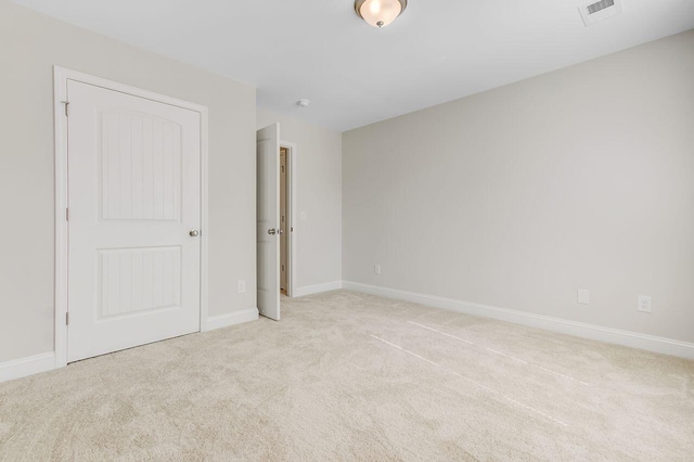 224 Young Town Cir, Orangeburg, SC 29118 - unfurnished bedroom featuring light carpet, visible vents, and baseboards