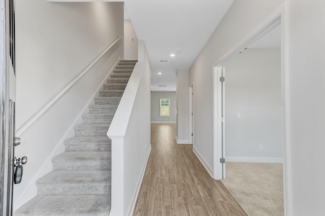 224 Young Town Cir, Orangeburg, SC 29118 - stairs with baseboards, wood finished floors, visible vents, and recessed lighting