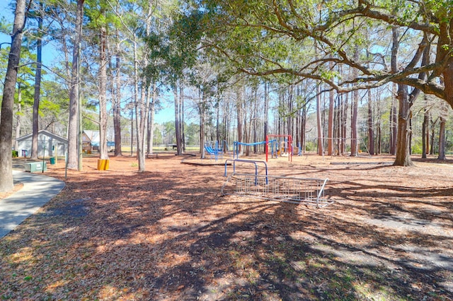 view of home's community with playground community