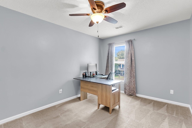 100 Conset Bay Ct, Goose Creek, SC 29445 - home office featuring a ceiling fan, baseboards, light carpet, and a textured ceiling