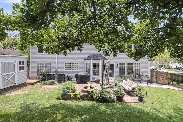 100 Conset Bay Ct, Goose Creek, SC 29445 - rear view of property with an outdoor living space with a fire pit, a wooden deck, and central AC unit