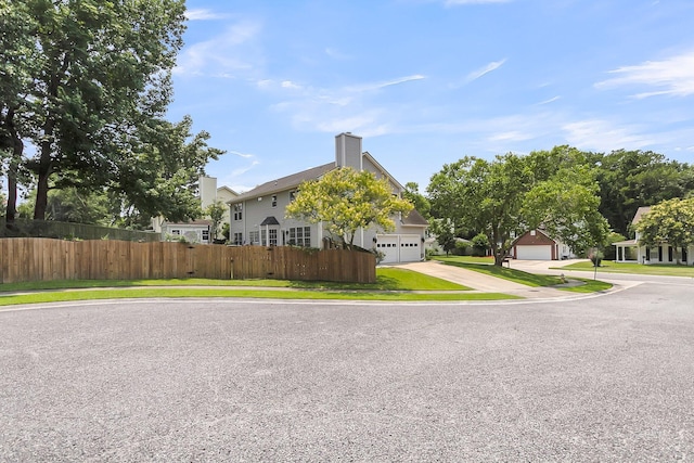 100 Conset Bay Ct, Goose Creek, SC 29445 - view of side of property featuring an attached garage, concrete driveway, and a residential view