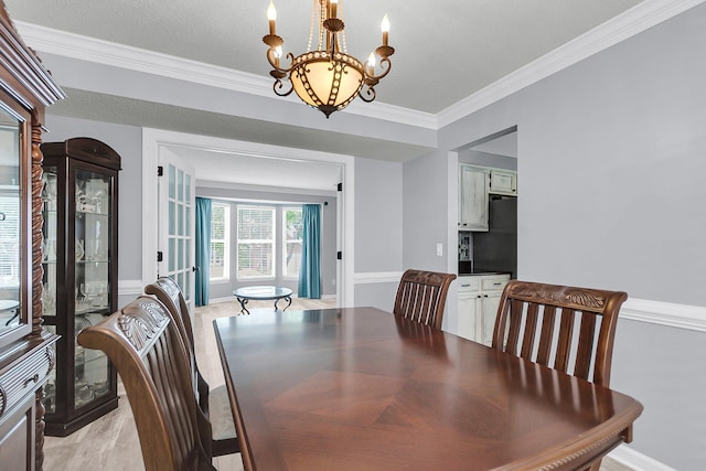 100 Conset Bay Ct, Goose Creek, SC 29445 - dining space featuring a chandelier, crown molding, and light wood-style floors