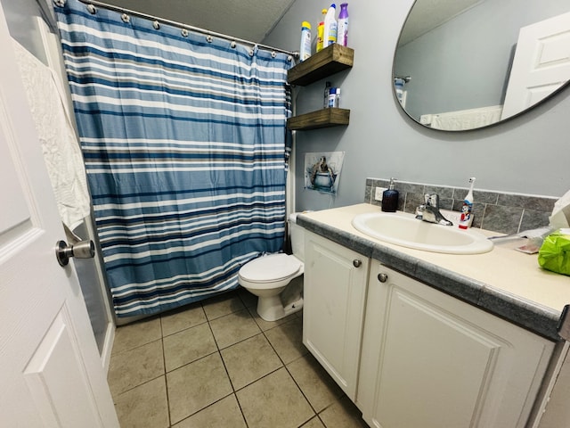 bathroom with tile patterned flooring, vanity, toilet, and a shower with shower curtain