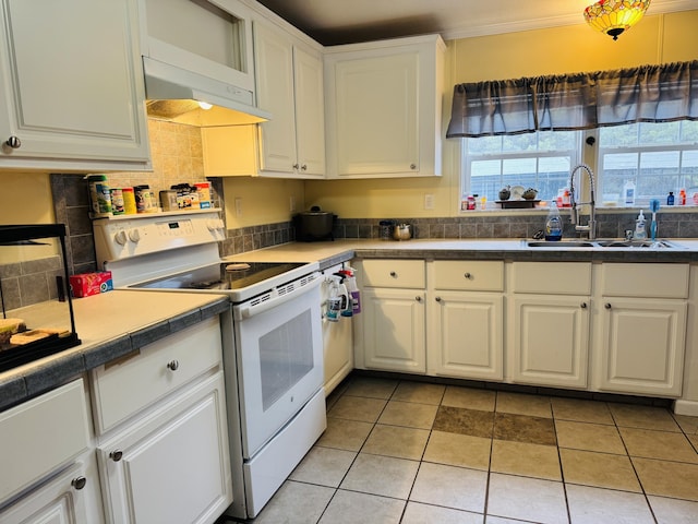 kitchen with white cabinetry, sink, tasteful backsplash, and white electric range oven