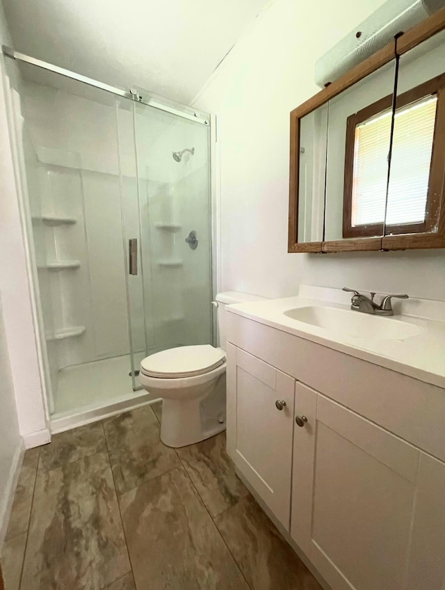 6287 Sniders Hwy, Walterboro, SC 29488 - full bath with a stall shower, toilet, and vanity