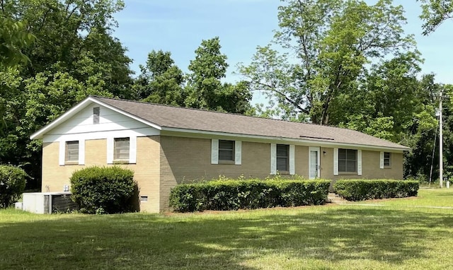 6287 Sniders Hwy, Walterboro, SC 29488 - ranch-style house with brick siding and a front lawn