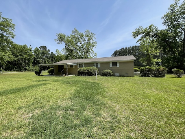 6287 Sniders Hwy, Walterboro, SC 29488 - back of house with a lawn and crawl space