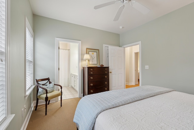 bedroom with light colored carpet and ceiling fan