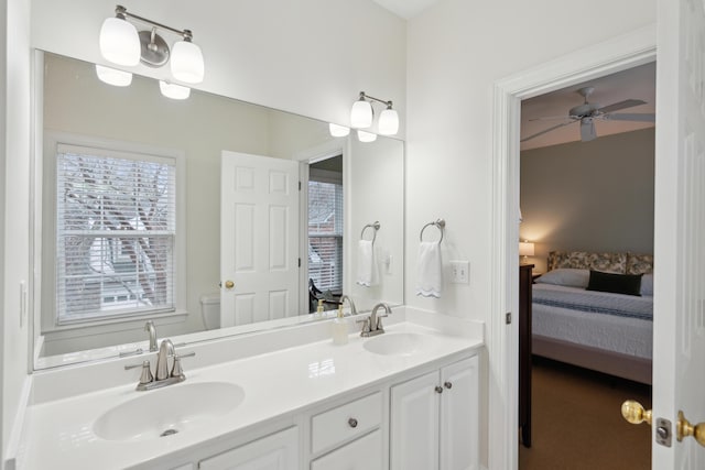 bathroom featuring vanity and ceiling fan