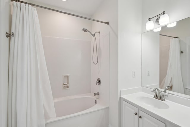 bathroom with vanity and shower / bath combination with curtain