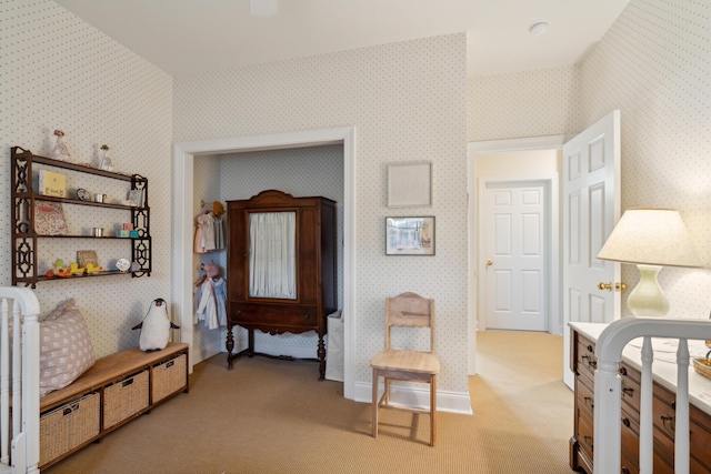 bedroom featuring light colored carpet