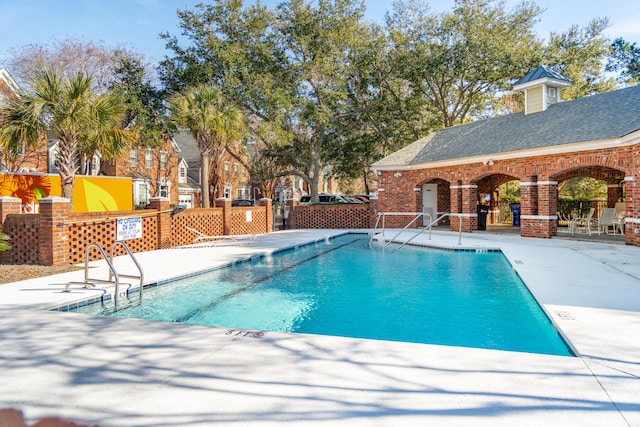 view of swimming pool featuring a patio