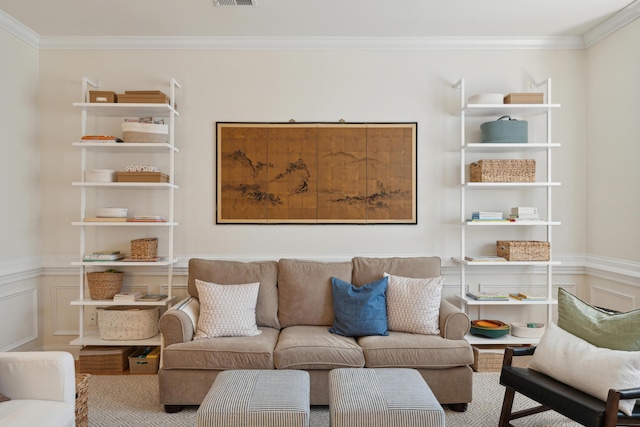 living room with hardwood / wood-style floors and ornamental molding