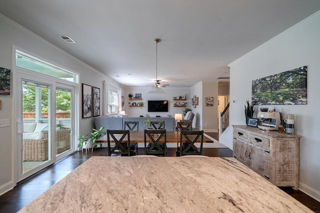 2024 Lanneau Ln, Johns Island, SC 29455 - dining space with crown molding, dark wood-style flooring, and ceiling fan