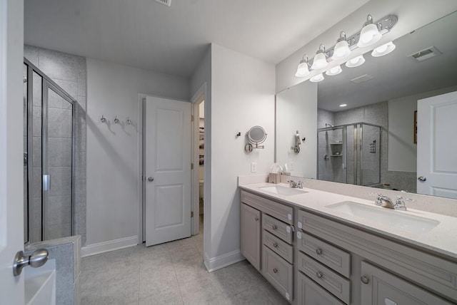 2024 Lanneau Ln, Johns Island, SC 29455 - bathroom with double vanity, a stall shower, and tile patterned floors