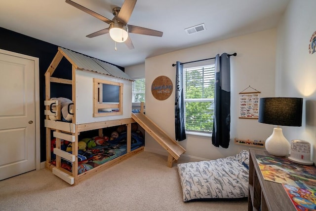 2024 Lanneau Ln, Johns Island, SC 29455 - carpeted bedroom with a ceiling fan