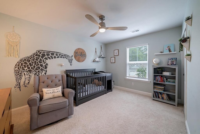 2024 Lanneau Ln, Johns Island, SC 29455 - carpeted bedroom featuring a ceiling fan and a nursery area