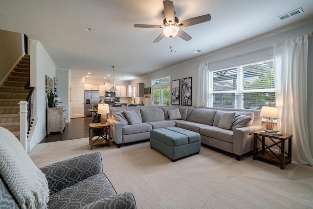 2024 Lanneau Ln, Johns Island, SC 29455 - living area featuring stairway, crown molding, ceiling fan, and recessed lighting